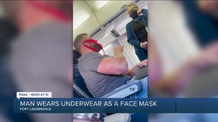 Bărbat dat jos din avion pentru că purta chiloți tanga roșii pe post de mască - VIDEO